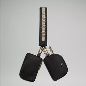 Lululemon Black Pouch Set with Gold Accents